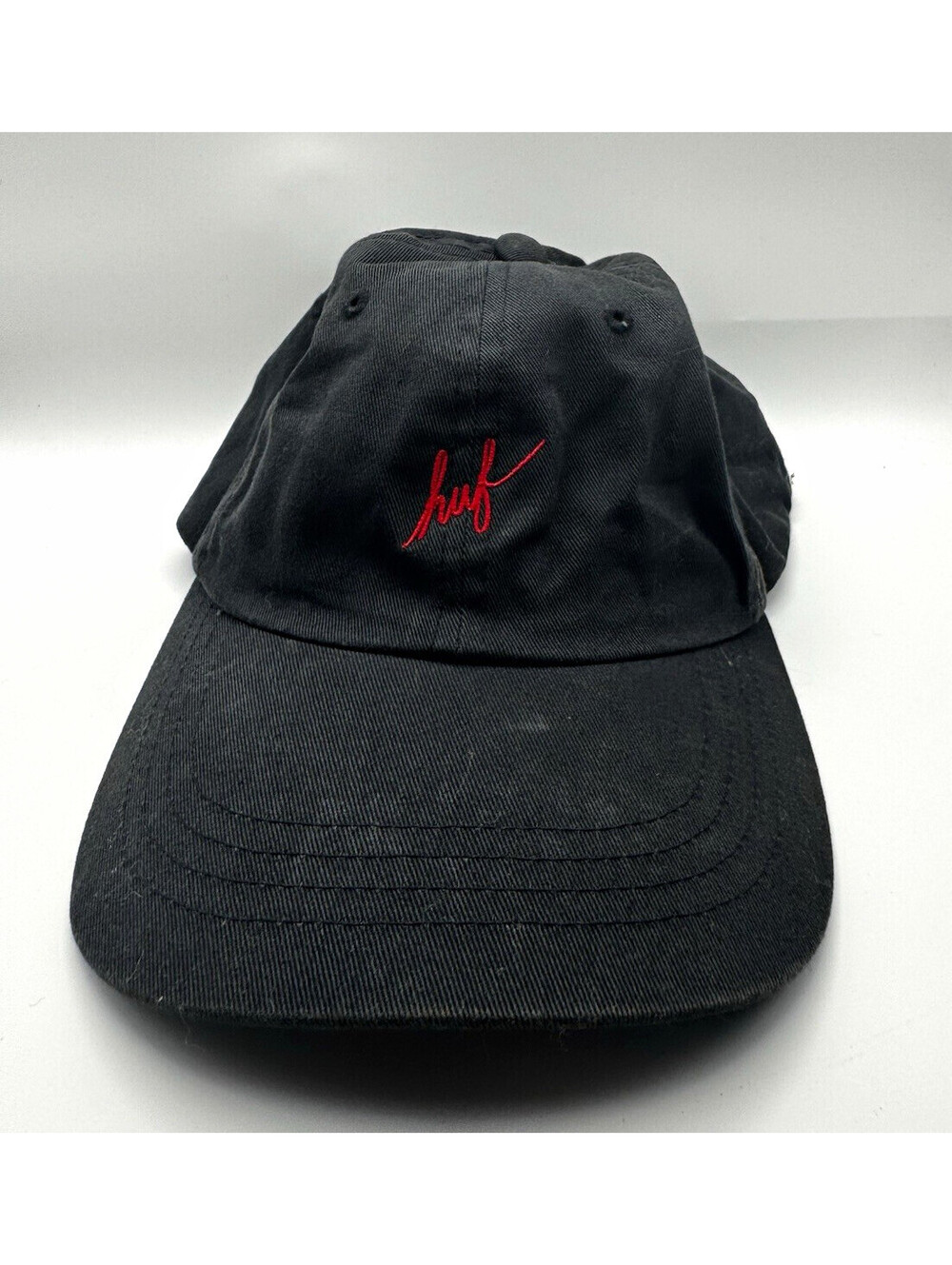 HUF Worldwide Black Strapback Dad Hat Red Cursive Logo Script Baseball Cap